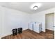 Bright laundry room with washer, dryer, and ample space for sorting and folding clothes at 7770 Sherrills Ford Rd, Sherrills Ford, NC 28673