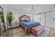 Bedroom featuring a king-size bed and stylish sliding barn doors at 8123 Village Harbor Dr, Cornelius, NC 28031