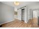 Versatile bonus room featuring hardwood flooring, closet space, and an open layout, perfect for a home office at 9007 St Croix Ln, Charlotte, NC 28277