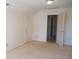 Neutral bedroom with plush carpet, light-colored walls, and ample closet space offers a serene atmosphere at 9331 Hanworth Trace Dr, Charlotte, NC 28277