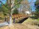 Community bridge in wooded area, perfect for walking or biking at 9331 Hanworth Trace Dr, Charlotte, NC 28277