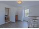 Bedroom featuring wood floors, a closet, and a view into an adjacent room at 108 Jackson St, Fort Mill, SC 29715