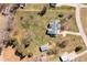 Expansive property with a well-maintained home, detached garage, and vast green space, perfect for outdoor activities at 111 Lynnette Dr, Mt Ulla, NC 28125