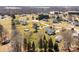 An aerial view showing the beautiful neighborhood, featuring spacious lots and a community pool at 111 Lynnette Dr, Mt Ulla, NC 28125