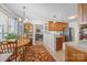 This bright breakfast nook is open to the kitchen and living room at 111 Lynnette Dr, Mt Ulla, NC 28125