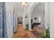 Grand foyer with hardwood floors, decorative rugs, and a view into the living spaces, perfect for welcoming guests at 111 Lynnette Dr, Mt Ulla, NC 28125