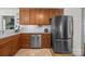 This well-appointed kitchen offers wood cabinets and stainless steel appliances at 111 Lynnette Dr, Mt Ulla, NC 28125