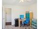 Bedroom featuring a desk, blue accents, carpeted floor, and ample workspace at 14429 Planters Knob Ln, Charlotte, NC 28273