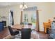 Cozy dining space featuring hardwood floors and natural lighting, perfect for intimate gatherings at 14429 Planters Knob Ln, Charlotte, NC 28273