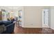 Inviting dining area with hardwood floors, natural lighting, and convenient access to the kitchen at 14429 Planters Knob Ln, Charlotte, NC 28273
