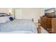 Main bedroom with a full bed, tv and dresser at 14429 Planters Knob Ln, Charlotte, NC 28273