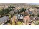 An aerial view of the lovely home nestled in a neighborhood with mature trees at 1509 Orange Hill Ct, Gastonia, NC 28056