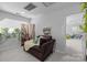Inviting reading nook with a chaise lounge, natural light, and serene decor at 1509 Orange Hill Ct, Gastonia, NC 28056