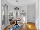 Cozy dining area with hardwood floors and natural light at 1509 Orange Hill Ct, Gastonia, NC 28056