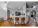 Kitchen with bar seating, stainless appliances, and updated fixtures at 1509 Orange Hill Ct, Gastonia, NC 28056