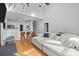 Open-concept living area with vaulted ceiling, modern kitchen, and comfortable seating at 1509 Orange Hill Ct, Gastonia, NC 28056