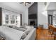 Stylish living area with fireplace and bar seating at 1509 Orange Hill Ct, Gastonia, NC 28056