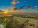 Expansive aerial view of rolling hills and farmland at sunset at 153 Badenyon Pl, Union Grove, NC 28689