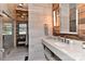 Modern bathroom showcasing wood-look tile, a glass shower, and upscale fixtures at 153 Badenyon Pl, Union Grove, NC 28689