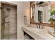 Modern bathroom with a walk-in shower, sleek vanity, and stylish fixtures, providing a spa-like experience at 153 Badenyon Pl, Union Grove, NC 28689
