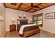 Comfortable bedroom with a wood ceiling, natural light, and classic decor, offering a peaceful sanctuary at 153 Badenyon Pl, Union Grove, NC 28689