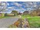 Scenic view of charming home with meticulously landscaped grounds and flowing stream at 153 Badenyon Pl, Union Grove, NC 28689
