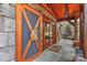 Charming front porch with wooden doors and slate tile flooring at 153 Badenyon Pl, Union Grove, NC 28689