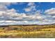 Expansive rural landscape with rolling fields, fall foliage, and distant mountain views offers a serene setting at 153 Badenyon Pl, Union Grove, NC 28689