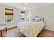 Comfortable bedroom with hardwood floors, natural light and a wrought iron bedframe at 18322 Indian Oaks Ln, Davidson, NC 28036