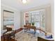 Bright office with hardwood floors and a large bay window with neighborhood views at 18322 Indian Oaks Ln, Davidson, NC 28036