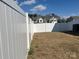 Backyard featuring newly installed white fence. Gives clear definition of yard and privacy at 202 J.P. Dr # 183, Albemarle, NC 28001