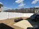 Well-maintained backyard featuring a white fence and a concrete patio for outdoor enjoyment at 202 J.P. Dr # 183, Albemarle, NC 28001