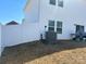 Backyard of this home featuring white fencing for privacy and an HVAC unit at 202 J.P. Dr # 183, Albemarle, NC 28001