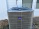 This is a close up view of the home's HVAC Carrier brand unit at 202 J.P. Dr # 183, Albemarle, NC 28001