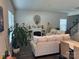 Cozy living room features a fireplace, a plush sofa, hardwood floors, and natural light from nearby windows at 202 J.P. Dr # 183, Albemarle, NC 28001