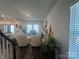 Bright living room with comfortable seating, a fireplace, and hardwood floors, with ample natural light from windows at 202 J.P. Dr # 183, Albemarle, NC 28001