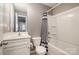 Bathroom featuring a combination shower and tub, and a white vanity at 2026 Talbert Ct, Charlotte, NC 28214