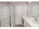 Bathroom featuring white vanity with chrome hardware, and a glass door shower at 2026 Talbert Ct, Charlotte, NC 28214
