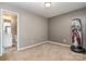 Bedroom featuring neutral carpet and view into the bathroom at 2026 Talbert Ct, Charlotte, NC 28214