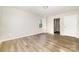 Spacious bedroom with wood-look floors and natural light at 2206 Hillcrest Ave, Albemarle, NC 28001