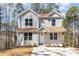 Charming two-story home with gray siding, brown roof, and inviting front entrance at 2206 Hillcrest Ave, Albemarle, NC 28001