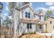 Two-story home with gray siding, brown roof, landscaped yard and a partial basement at 2206 Hillcrest Ave, Albemarle, NC 28001