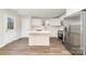 Stylish kitchen features white cabinets, stainless appliances, and an island at 2206 Hillcrest Ave, Albemarle, NC 28001