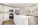 Modern kitchen with white cabinets, stainless steel appliances, and a center island at 2206 Hillcrest Ave, Albemarle, NC 28001