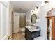 Updated bathroom boasts a stylish vanity with marble countertop, modern fixtures, and a shower-tub combo at 2652 Gabriel Ct, Fort Mill, SC 29715