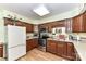 Functional kitchen featuring stainless steel appliances, wood cabinets, and ample counter space at 2652 Gabriel Ct, Fort Mill, SC 29715