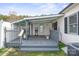 Cozy back porch featuring a grill and gray wood flooring at 3966 Peach St # 56, Newton, NC 28658