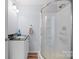 Bathroom featuring a sink and walk-in shower at 3966 Peach St # 56, Newton, NC 28658