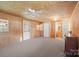 Spacious bedroom with carpet flooring, neutral tones, and ample closet space at 3966 Peach St # 56, Newton, NC 28658