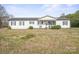 Ranch-style house features a well-manicured lawn and classic curb appeal at 3966 Peach St # 56, Newton, NC 28658